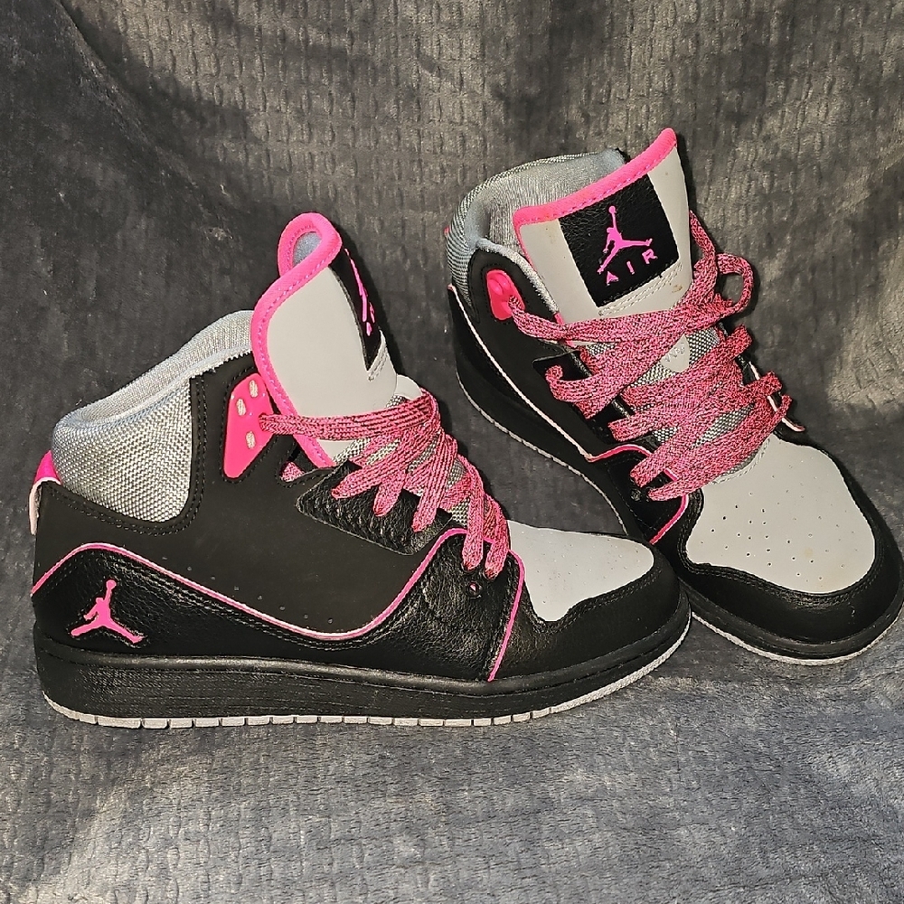 Air Jordan Black and Pink High-Top Sneakers